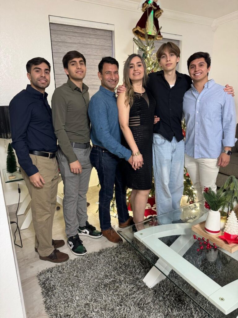 Nelson Bautista with his wife and four sons